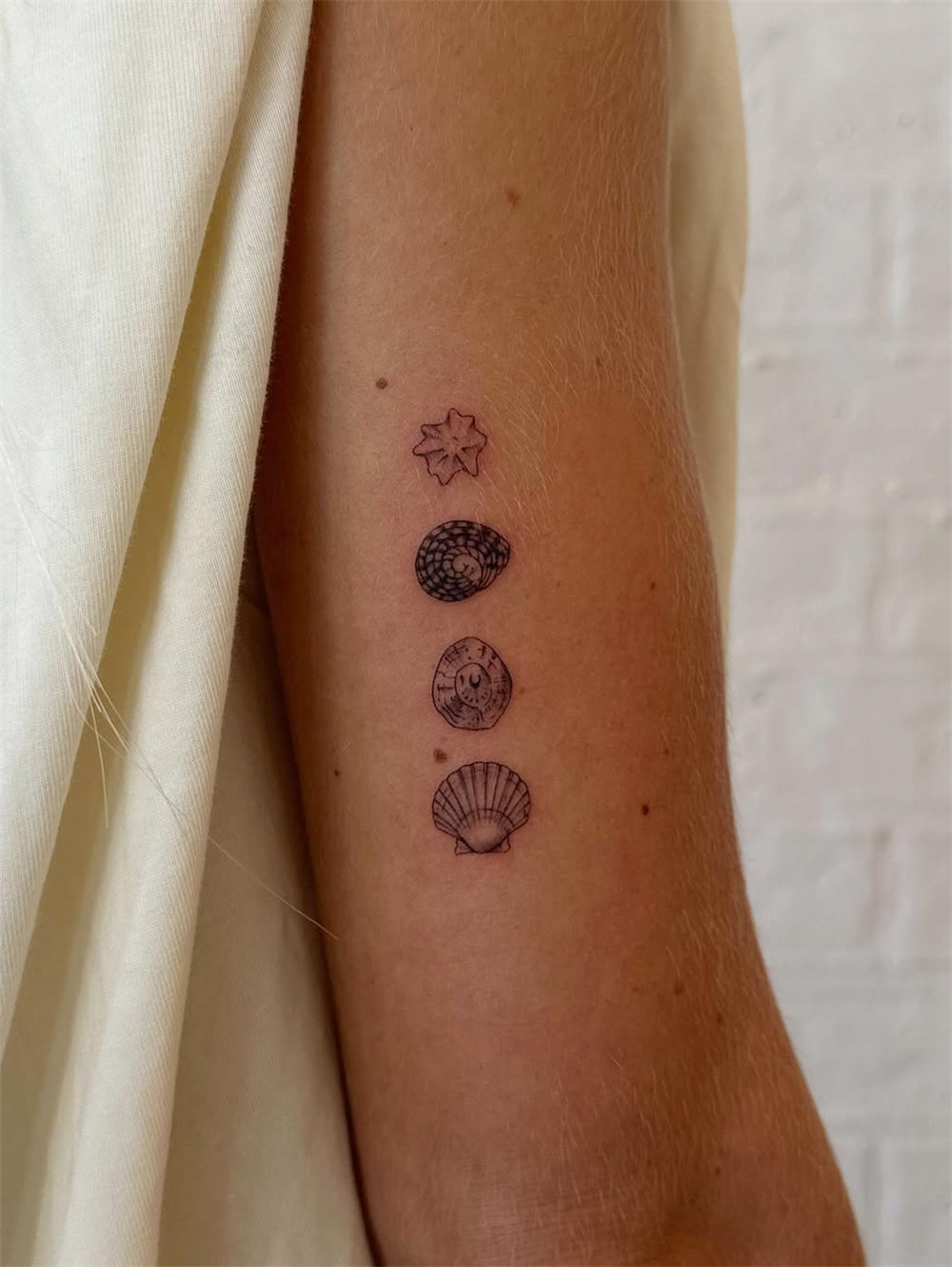 30 Simple and Small Tattoos With Meaning for Women