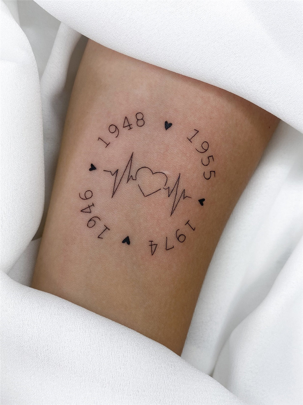 30 Simple and Small Tattoos With Meaning for Women