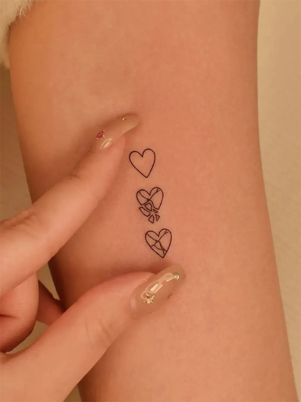 30 Simple and Small Tattoos With Meaning for Women