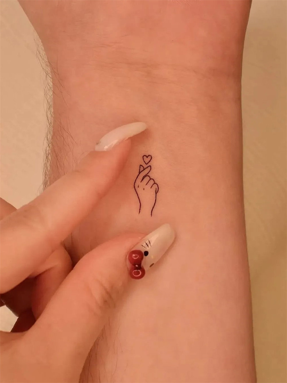 30 Simple and Small Tattoos With Meaning for Women