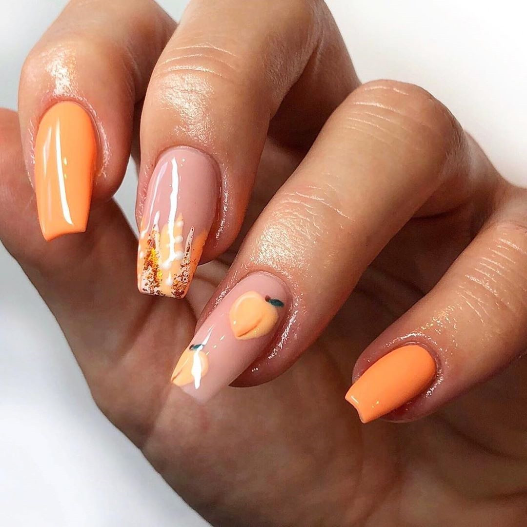 Summer nail ideas: we have put together 50 of the best summer nails. There is something for everyone from light and bright to bold to sparkling glitter. #summernailideas #summernails #nails2021trends