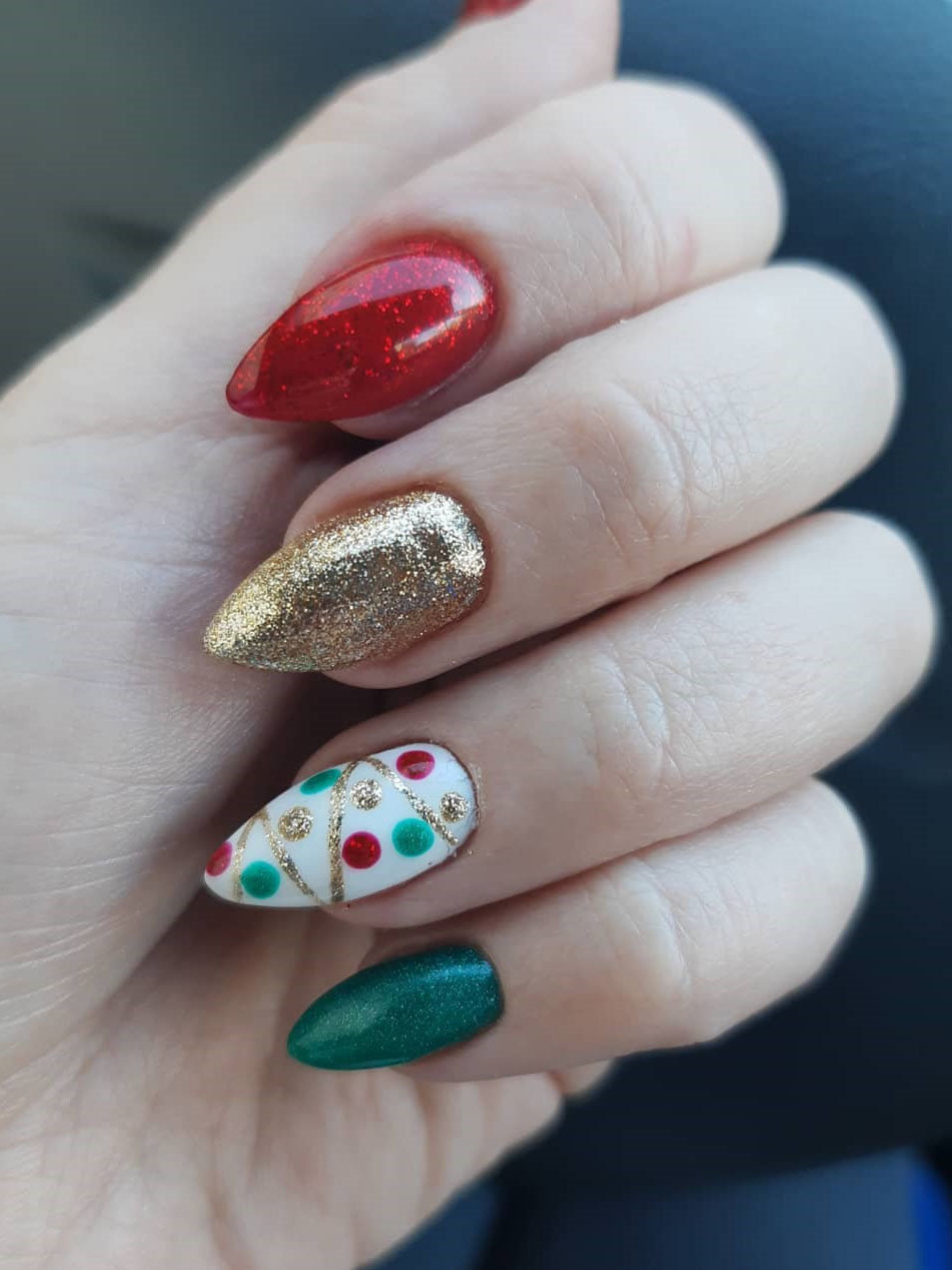 Here we have Christmas nails designs. All of the nails have a different design including snowflakes, reindeer and so on. #WinterNails #ChristmasNails