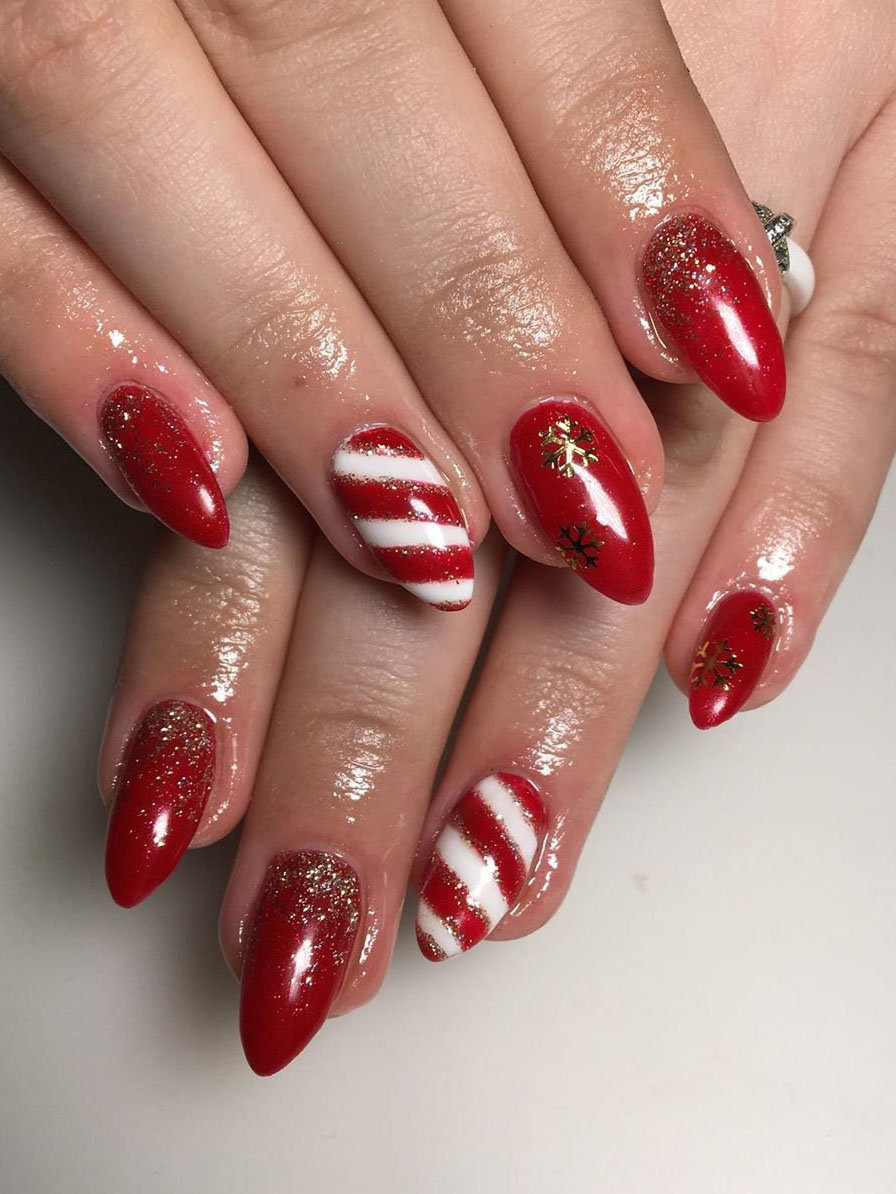 Here we have Christmas nails designs. All of the nails have a different design including snowflakes, reindeer and so on. #WinterNails #ChristmasNails