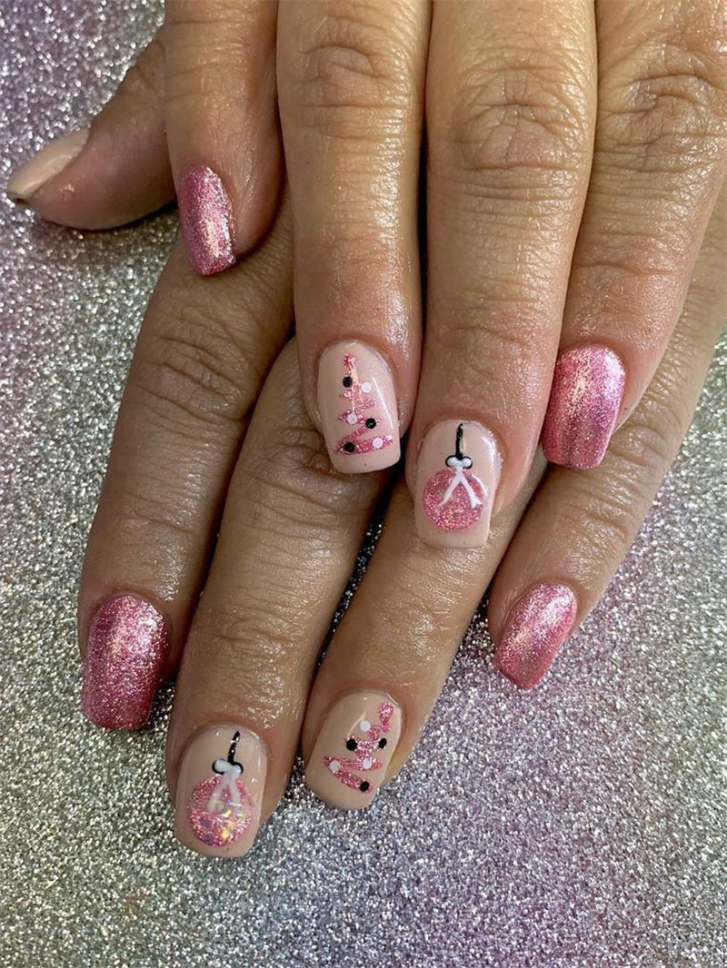 Here we have Christmas nails designs. All of the nails have a different design including snowflakes, reindeer and so on. #WinterNails #ChristmasNails